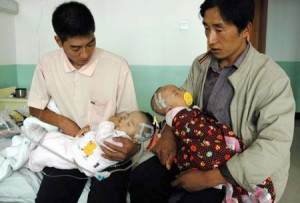 toxic_milk Two babies at a military hospital in Lanzhou, Gansu province